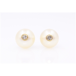  Pair of pearl gold stud ear-rings each set with a single diamond, hallmarked 18ct  