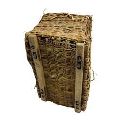 Large wicker basket, metal bound hinged lid, with carrying handles, on baton sledges with metal castors (W91cm, H77cm, D67cm); together with a stool with cane seat (50cm x 38cm, H45cm)