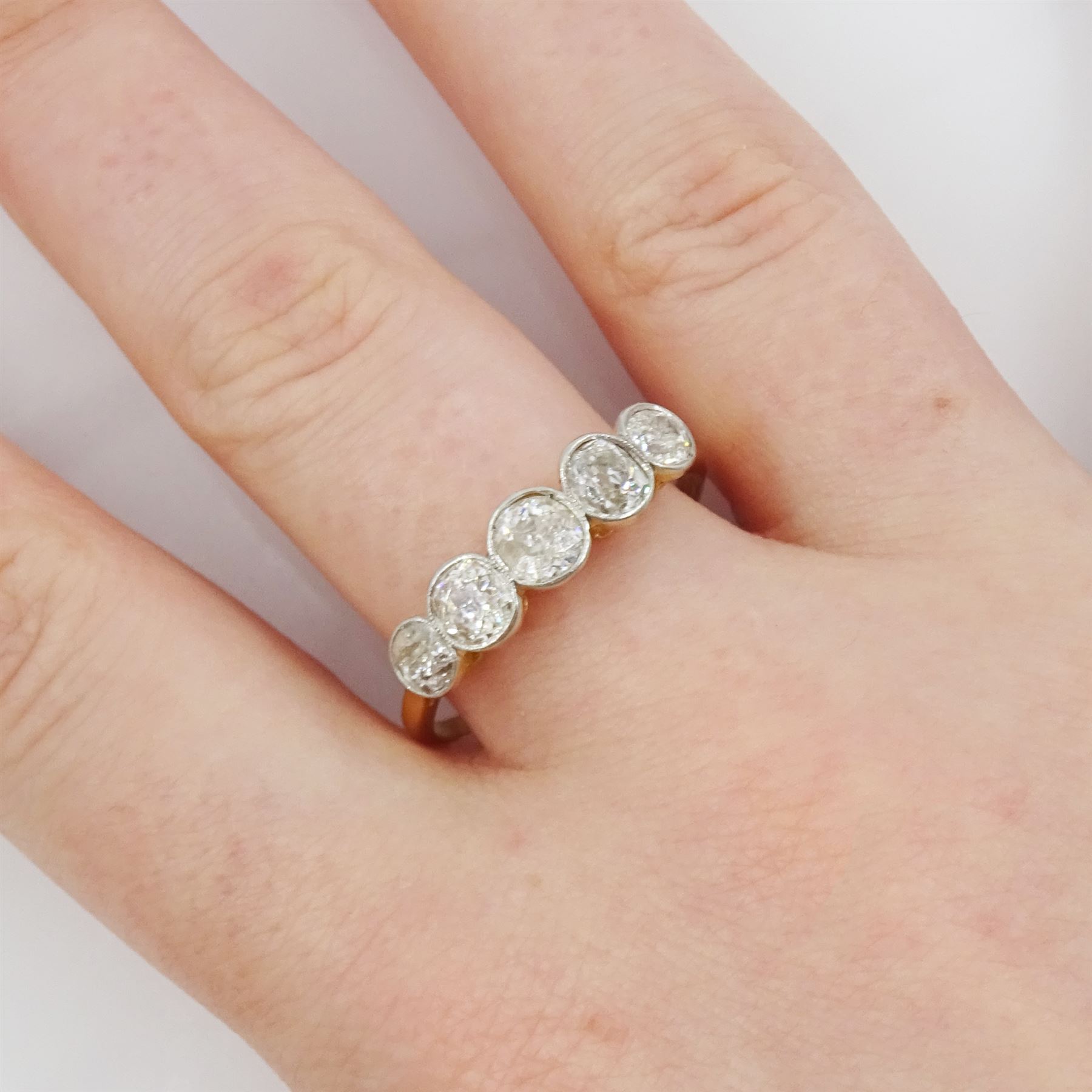 Early 20th century gold five stone old cut diamond ring, stamped 18ct, total diamond weight approx 1.50 carat