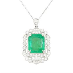 Platinum Colombian emerald and diamond pendant necklace, single octagonal cut emerald of 7...
