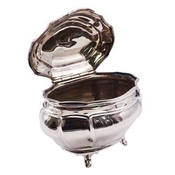 Edwardian silver tea caddy of bombe form, the hinged cover engraved with lion crest, upon four paw feet, hallmarked Goldsmiths & Silversmiths Co Ltd, London 1908, H8.5cm W10cm, approximate weight 5.25 ozt (163.2 grams)