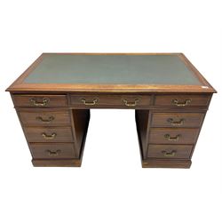 Early 20th century mahogany twin pedestal desk, fitted with nine drawers