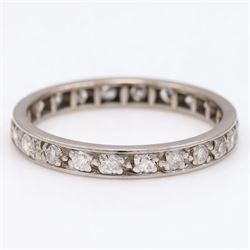 Palladium diamond full eternity ring, set with twenty-three round cut diamonds, total diam...