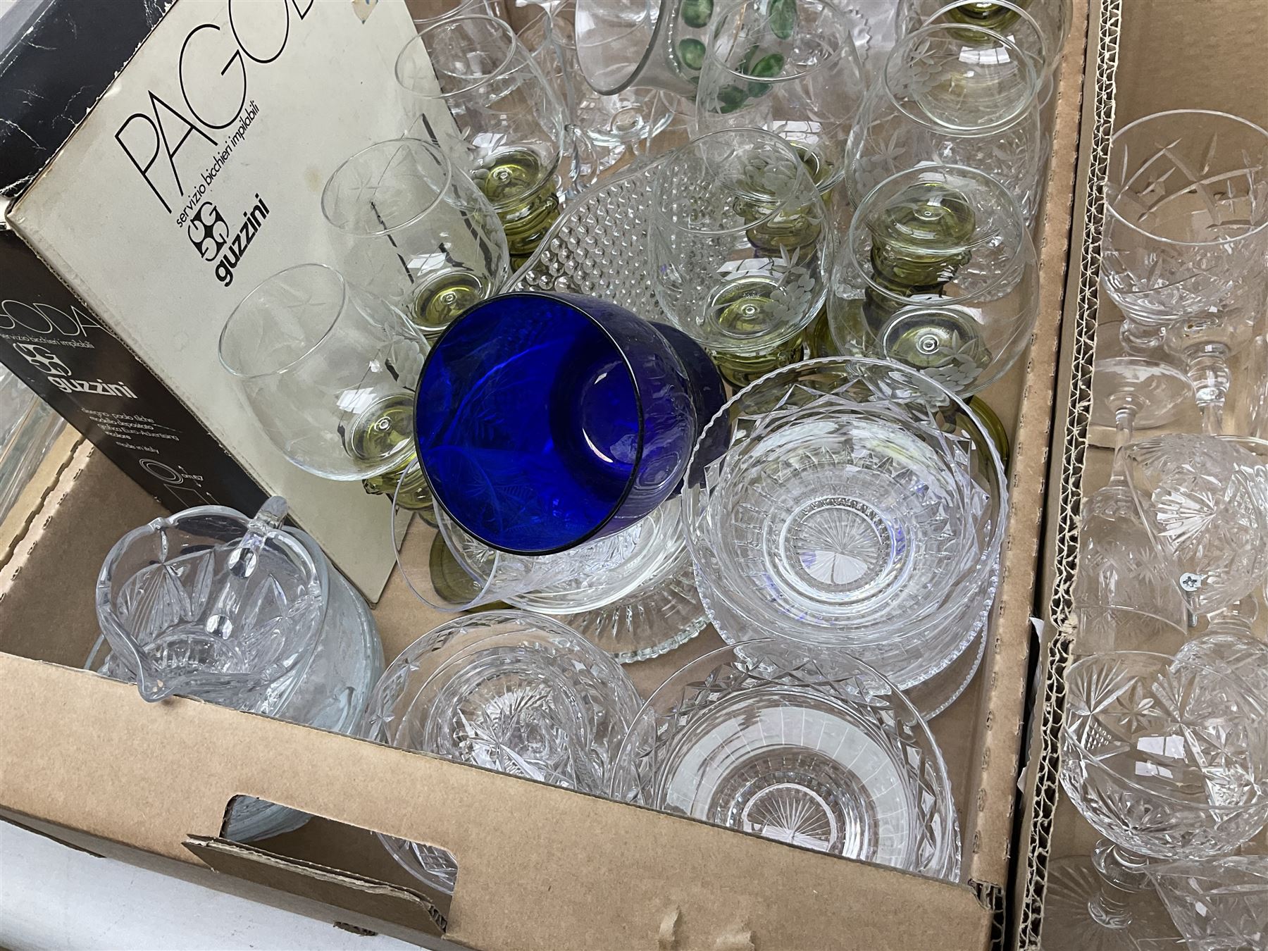 Quantity of glass ware to include boxed Pagoda Guzzini tumblers, Roemer type glasses with etched bowls, Caithness vase, other engraved glass, bowls, decanter, etc