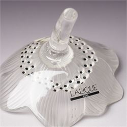 Lalique Lions Head glass ashtray and an 'Anemone' flower, both marked Lalique, France and boxed (2)