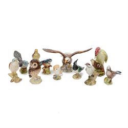 Eleven Beswick bird figures, including Lesser Spotted Woodpecker 2420, Kestrel 316, Lapwing 2416 etc   