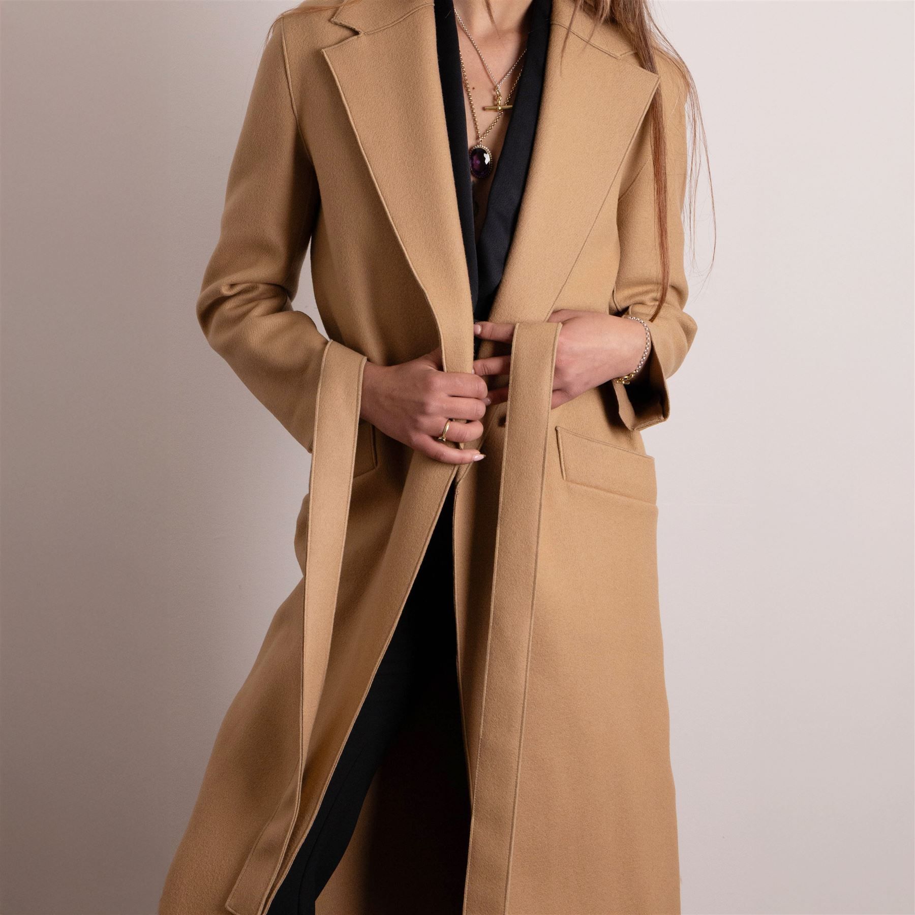 Amanda Wakeley London - full-length coat in camel wool, with notched lapels, concealed front fastening, self-tie belt, and side slip pockets, of minimalist tailored form, from the 'Petite Chic' line, unused