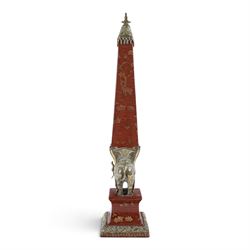Wong Lee ceramic and brass obelisks, decorated with deer, trees and butterflies mounted on a brass elephant with brass to the base and top, H64cm
