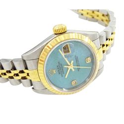Rolex Oyster Perpetual DateJust ladies stainless steel and gold automatic wristwatch, circa 1999, Ref. 79173, serial No. A854711, blue jadeite dial with diamond dot hour markers at 6 and 9 o'clock, on Rolex Jubilee stainless steel and gold bracelet, with fold-over clasp, boxed with papers and additional links