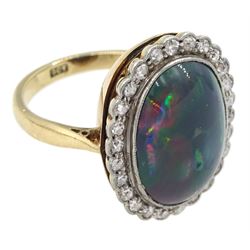 Early 20th century gold milgrain set oval opal and old cut diamond cluster ring, stamped 9ct 