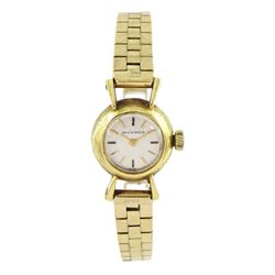 Movado ladies 18ct gold manual wind wristwatch, on 9ct gold link bracelet, hallmarked