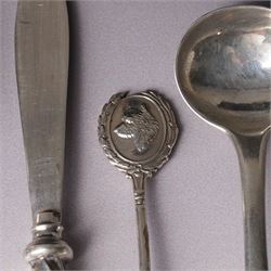 Assorted silver including two 19th century condiment spoons, coffee spoon, napkin ring, knife, two silver brooches and a charm 