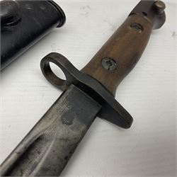 WWI British 1907 pattern bayonet, the 43cm fullered blade by Wilkinson with various marks to the ricasso; in leather covered scabbard numbered 294 to the throat and stamped M/58 L58.5cm overall