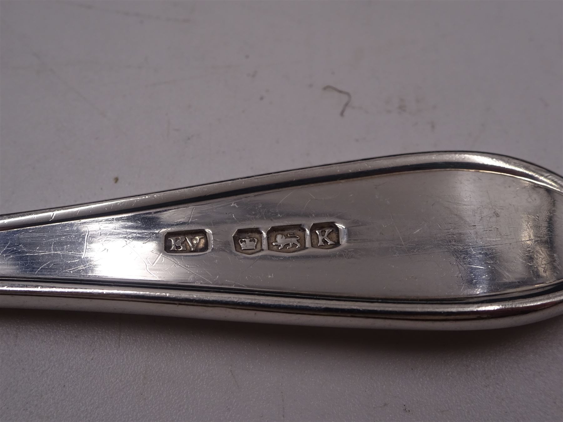 Group of silver flatware, to include set of three 1930s Old English pattern coffee spoons, hallmarked Z Barraclough & Sons, London 1938, pair of silver Celtic Point pattern spoons, hallmarked Viner's Ltd, Sheffield 1952, two pairs of silver sugar tongs, the first example with bamboo decoration, hallmarked Elkington & Co Ltd, Birmingham 1904 and the second example hallmarked Cooper Brothers & Sons Ltd, Sheffield 1915, etc 