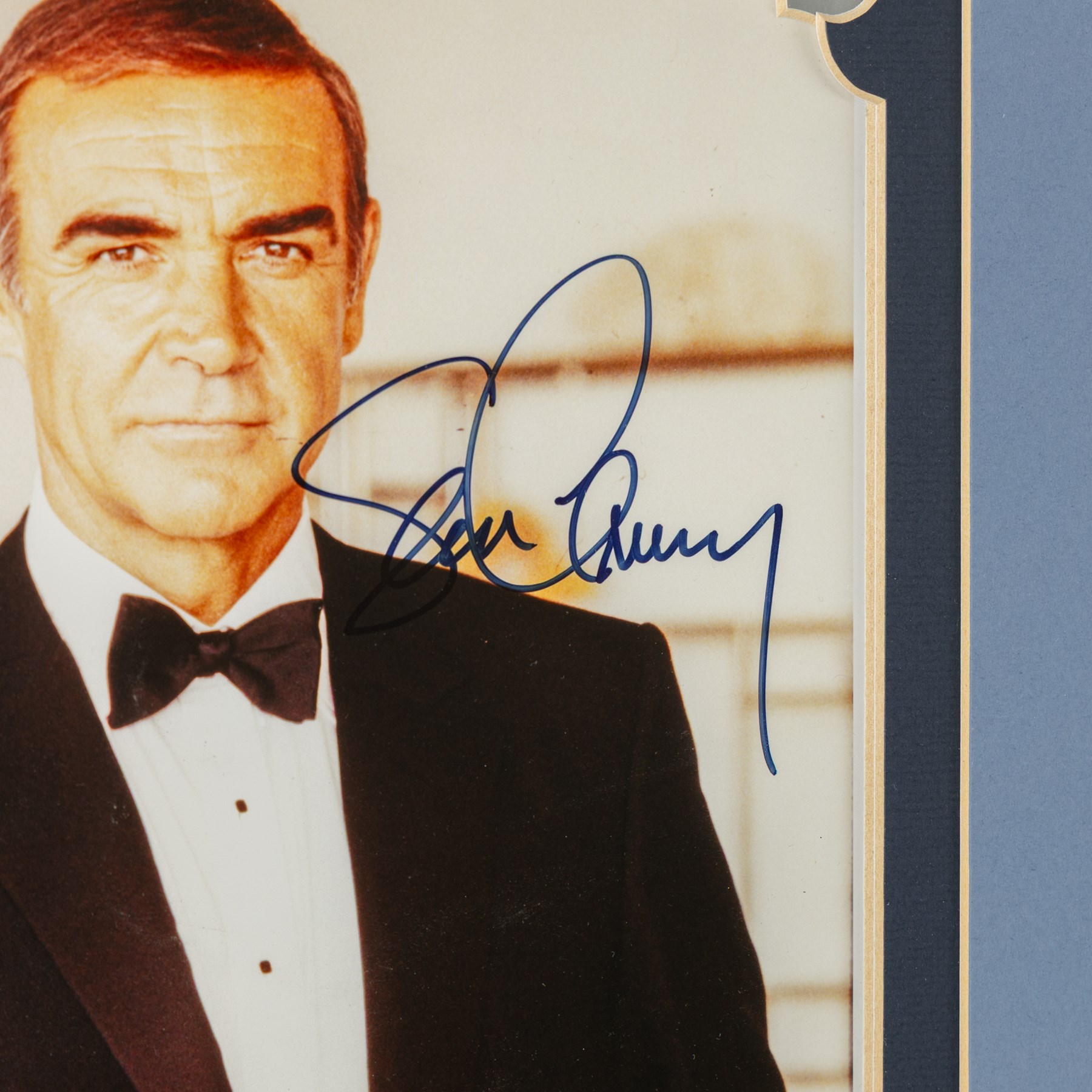 James Bond 40 years 20 films signed commemorative montage, comprising signed photographs of Sean Connery, George Lazenby, Roger Moore, Timothy Dalton and Pierce Brosnan, each with a certificate of authenticity from UACC Dealer Lester Freeman, framed, frame H79cm, W100cm