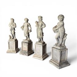 The Four Seasons - set of four traditional cast stone garden figures, in a weathered finish, stamped 'Lucas'