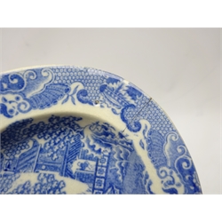  Collection of early 19th century Pearlware, decorated in the Willow pattern, two dinner and side plates painted with iron-red borders and two early 19th century oval plates printed with pagoda scene,  D25cm max   