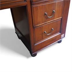 And So To Bed - French cherry wood twin pedestal dressing table, the rectangular top over seven drawers arranged with a central drawer and three drawers to each pedestal, panelled sides with louvred detail, raised on turned bun feet
