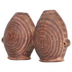 Miniature Egyptian pottery double-bodied jar, Predynastic Period, the two conjoined jars of ovoid form, each with pierced lug handle, and painted with spirals, tapering to flat bases, bearing Sotheby's label, H6cm W10cm
