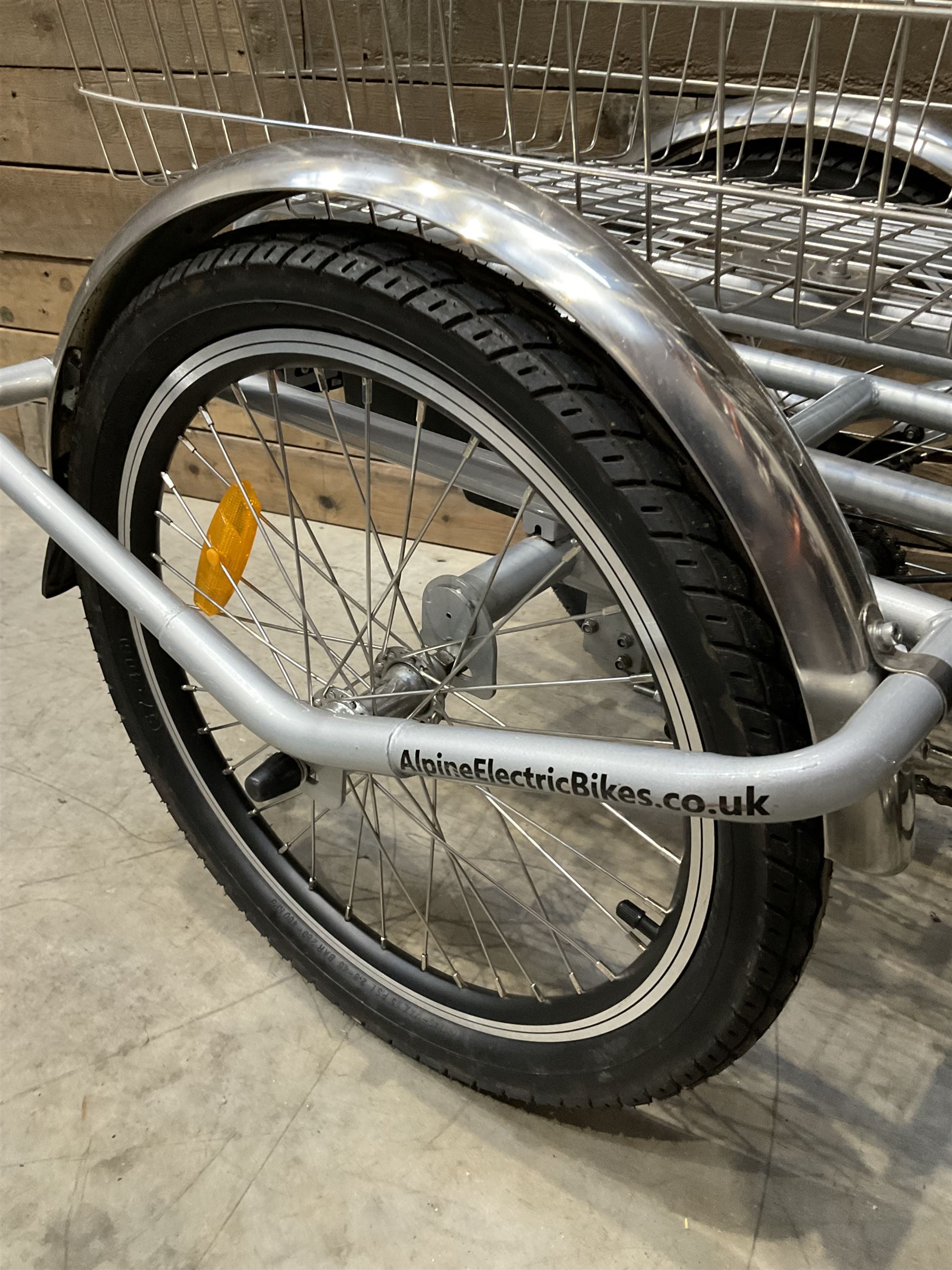 Alpine electric tilt trike - power assisted with throttle (no need to pedal), 15.5mph with 40 mile range, only 37 miles from new, silver finish, removable battery with charger, YoungDo gell seat with cover, £2749 new.