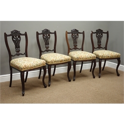  Set four Edwardian mahogany drawing room chairs, with fret work and carved cresting rail and splat, cabriole supports, recently recovered in floral pattern fabric  