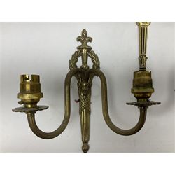 Set of six brass gilt wall sconces, each with two curved branches rising from tapering backplates, H24cm