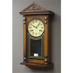  Large early 20th century oak cased wall clock, another oak cased wall clock and a stained beech cased 31-day wall clock  