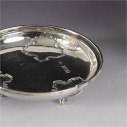 Early 20th century silver porringer, decorated in relief with foliate decoration and later engraving to body, upon a stepped circular foot, with matching cover/stand, both hallmarked Johnson, Walker & Tolhurst, London 1913, H8cm