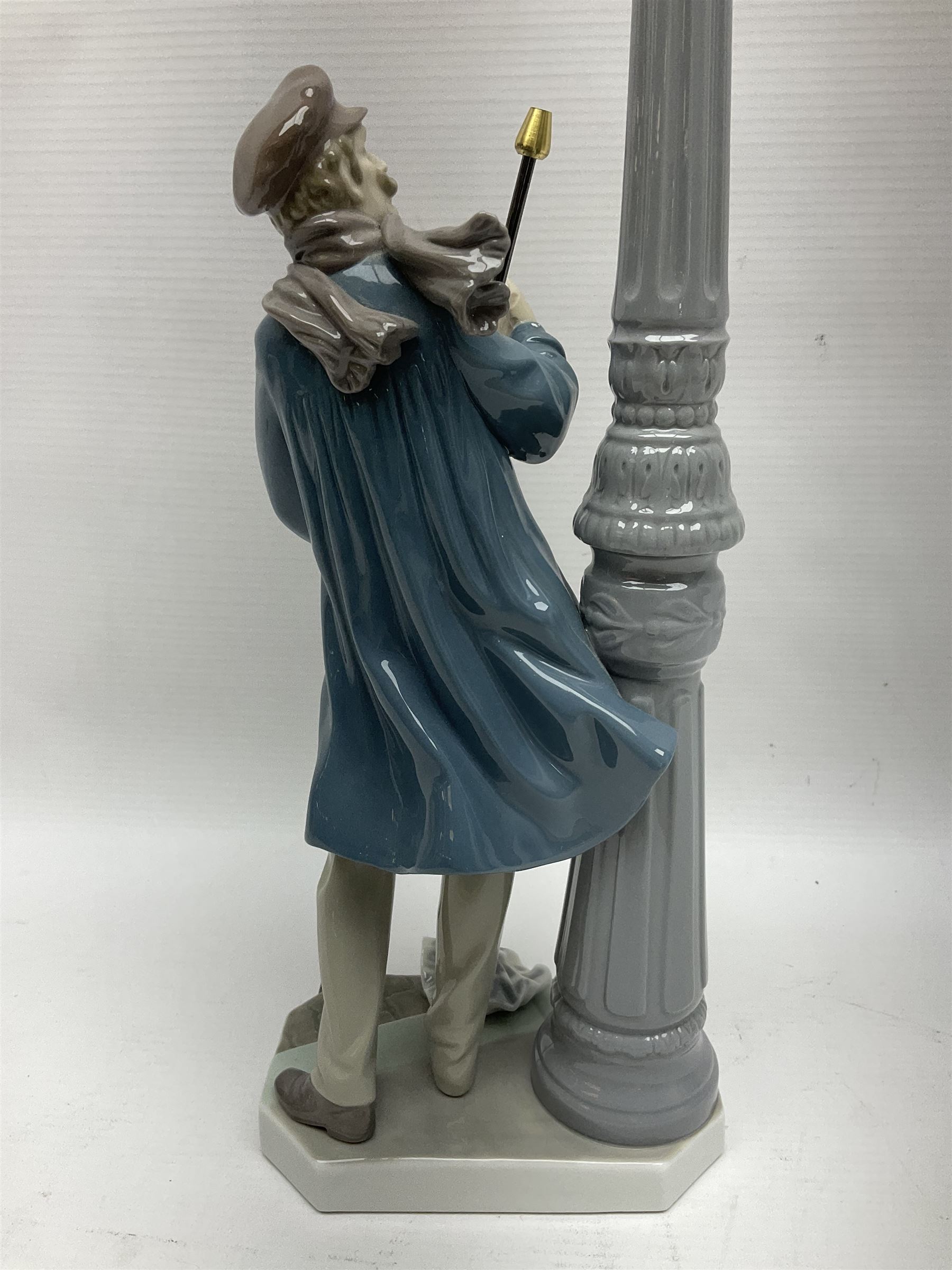 Five Lladro figures, including The Lamp Lighter no 5205,  Girl and Kittens no 6102, Cat no 5113 etc