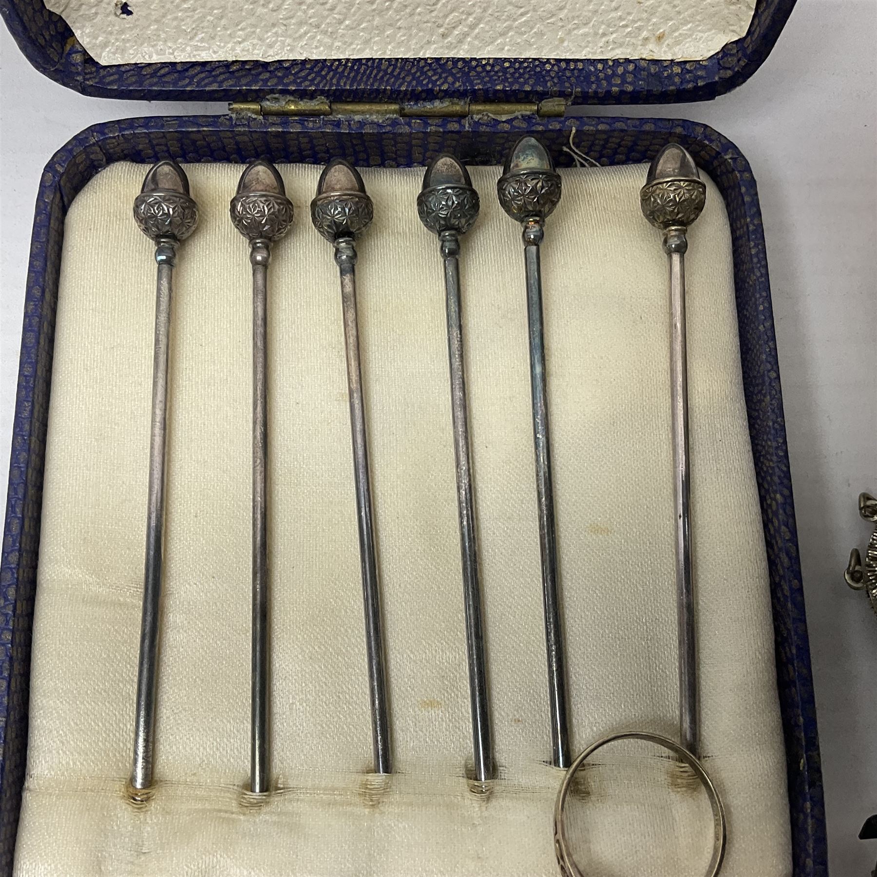 Set of six silver plated cocktail sticks, with acorn finials, hallmarked silver christening cup, silver ring and earrings and a costume jewellery cameo bracelet 