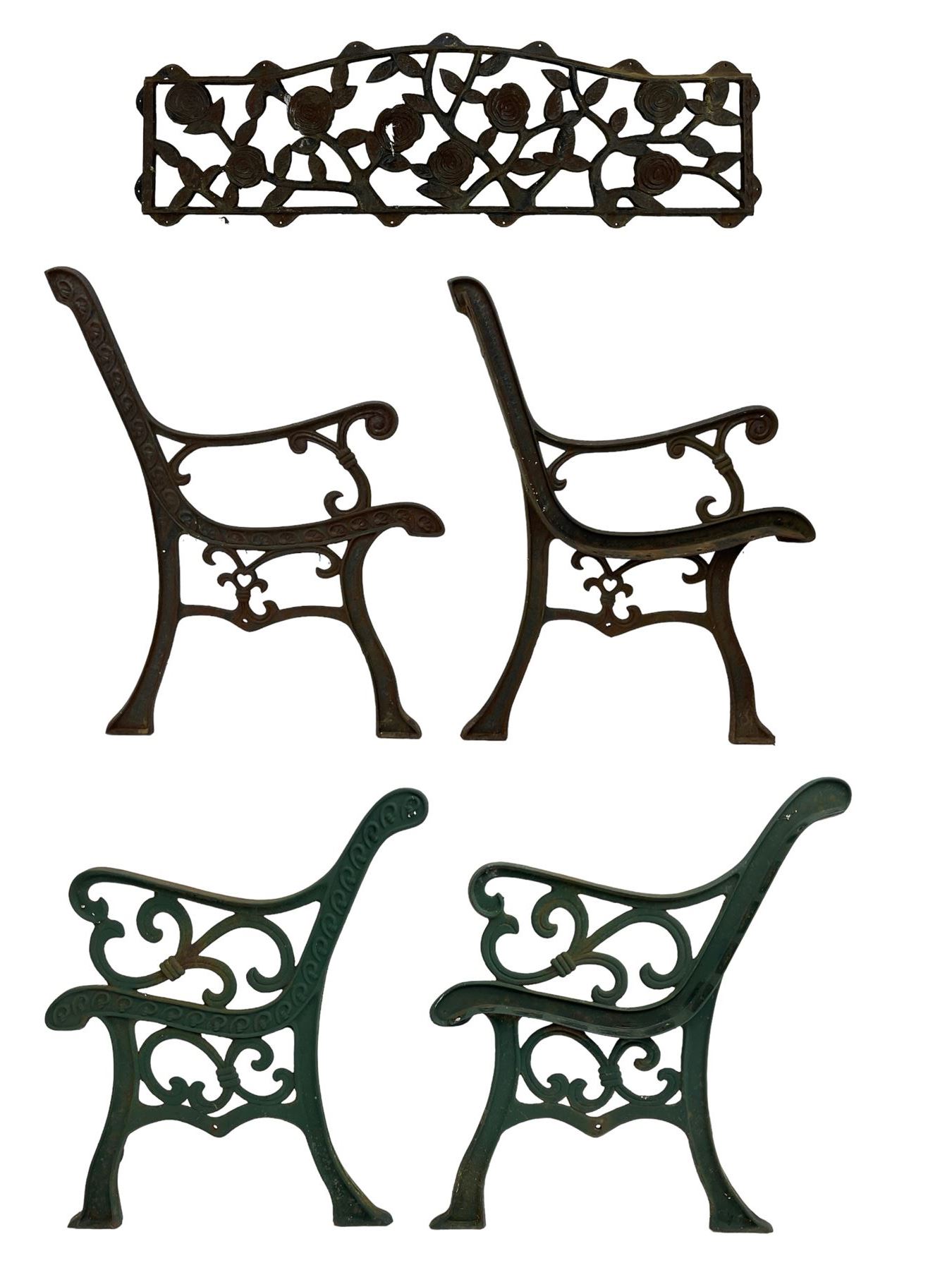 Pair cast iron garden bench ends decorated with scrolling design (H83cm), another pair of cast iron bench ends (H78cm), and a cast iron bench back decorated with foliage branches and roses (W110cm x H30cm)