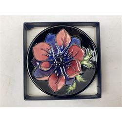 Two Moorcroft pin dishes decorated in the 'Anemone' pattern, with stamped marks beneath, D11.5cm, both boxed