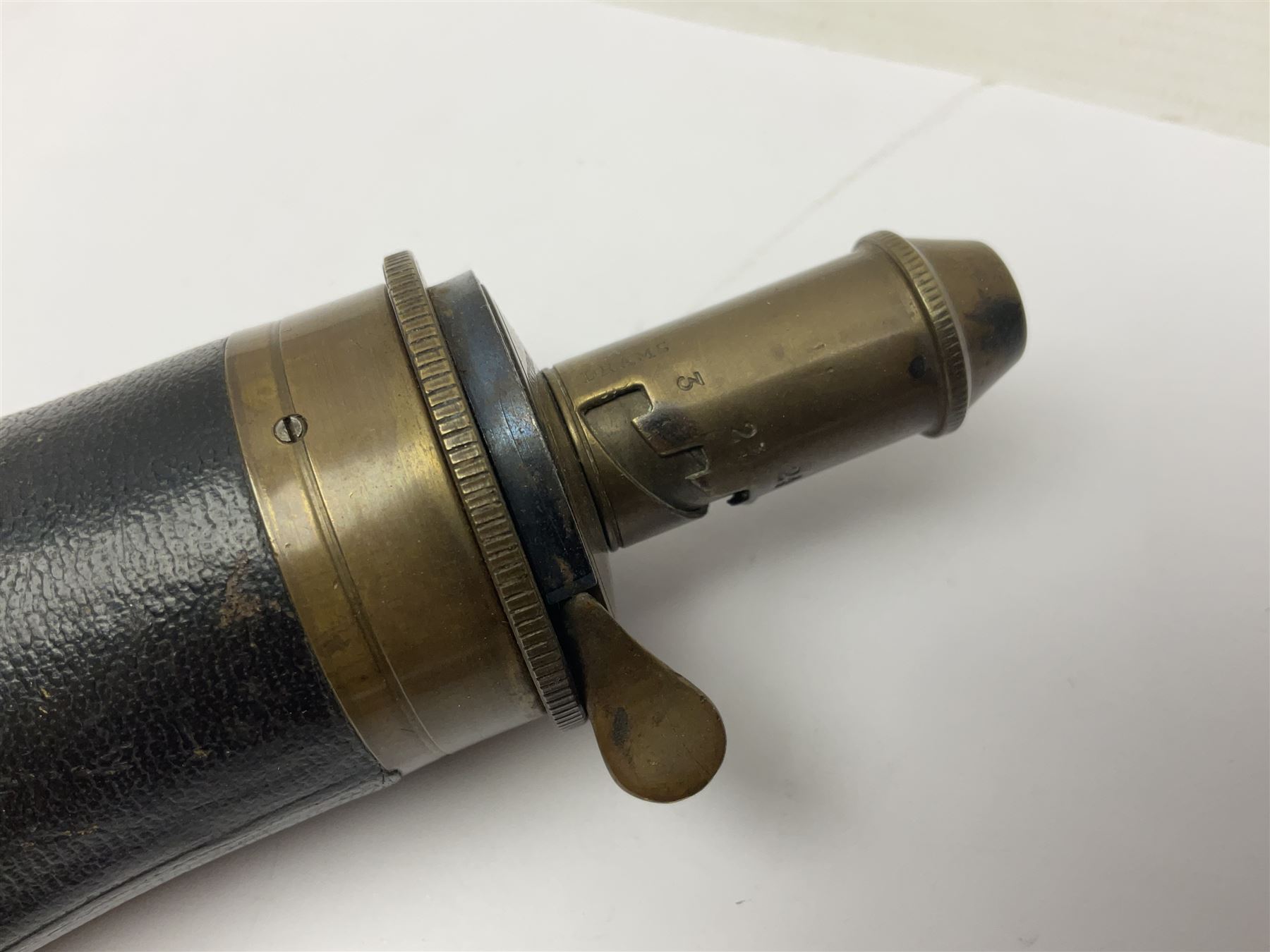 19th century James Dixon & Sons leather covered powder flask with patent action adjustable shot measure to dispense 2 1/4 - 3 drams; marked Parker Hale Ltd. Birmingham England L20cm