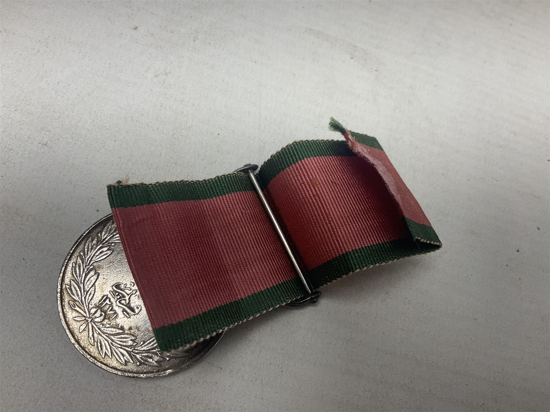 Turkish Crimea Medal 1855, unnamed, fitted with scrolling suspension bar and ribbon