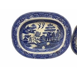 Group of 19th century pottery, comprising Copeland Spode slop bucket or pail with raffia wrapped handle, decorated with panels of exotic birds against a blue band, with printed mark beneath, not including handle H27.5cm D28cm, a Staffordshire figure titled Louis Napoleon, two plate and white Willow pattern platters, and a Masons Ironstone bowl, of octagonal form decorated in Imari type pallet, D22cm. 