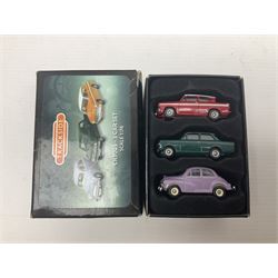 Over forty 1:76 scale die-cast models of cars and commercial vehicles; some boxed; and eight small scale models of motorcycles; all unboxed