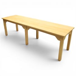 Mid 20th century beech dining table, rectangular top with rounded corners, plain apron with shaped brackets, raised on six square section supports