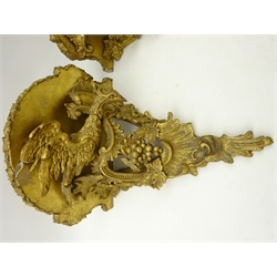  Pair early 19th century giltwood and gesso wall brackets, each modelled as a Hoho bird within a surround of acanthus leaves and grape vines, with shaped plateau, H37cm x W35cm   