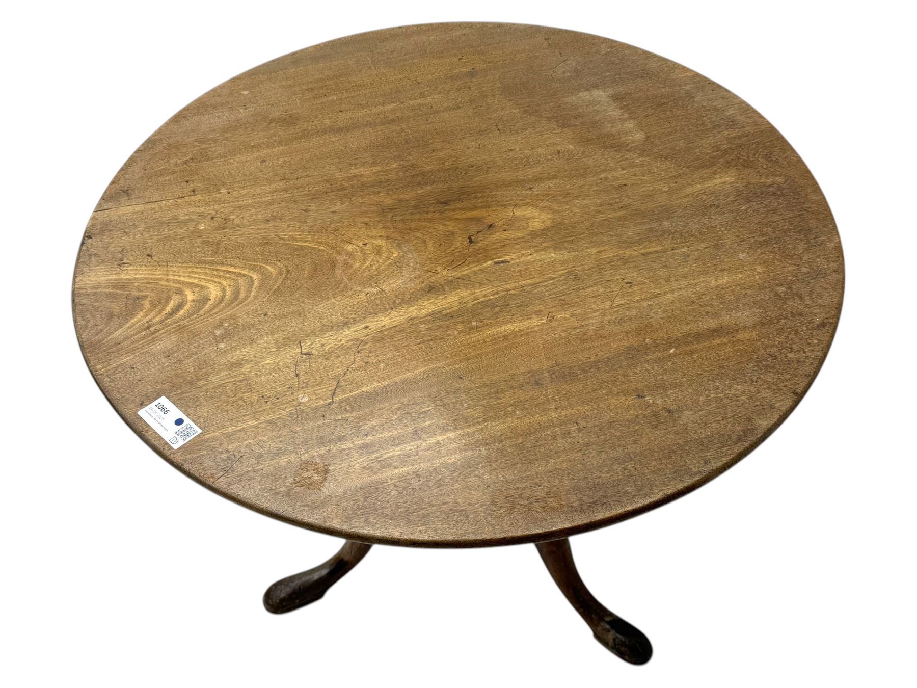 George III mahogany tripod table, folding hinged top above pedestal on three cabriole legs 