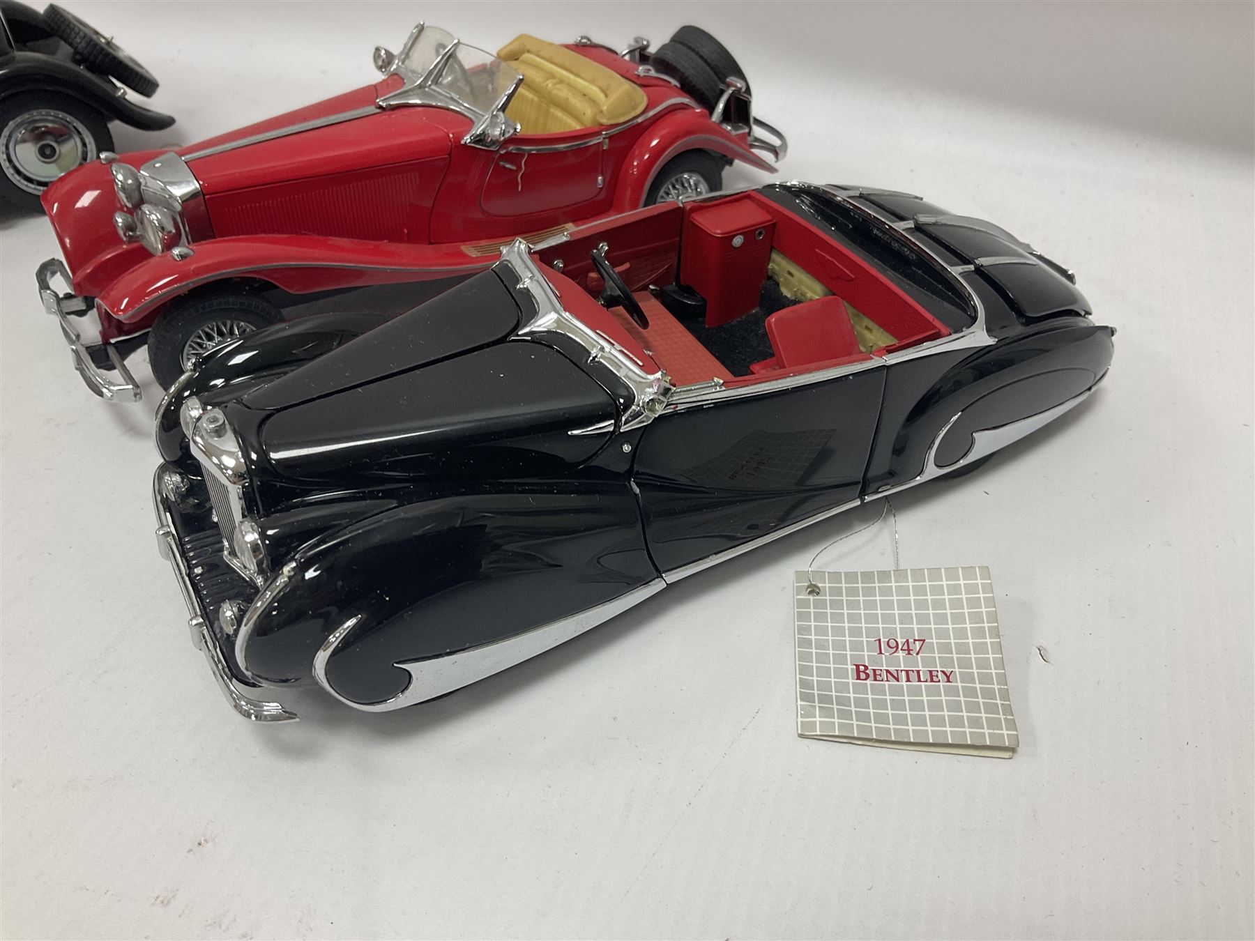 Franklin Mint - five 1:24 scale die-cast precision models comprising 1930 Bugatti Royale Coupe Napoleon, 1933 Duesenberg SJ Twenty Grand, 1935 Mercedes Benz 500K Special Roadster, 1938 Jaguar SS-100, and 1947 Bentley 