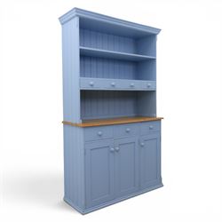 Pine blue painted dresser, upper section with tongue and grove back, two shelves with thre...