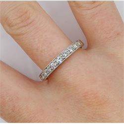 Gold milgrain set round brilliant cut diamond half eternity ring, stamped 18ct Plat