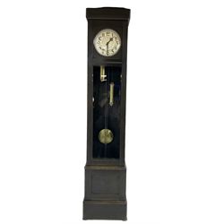  20th century Art Deco- oak cased 8-day longcase clock c1930, flat topped case with a fully glazed door on a stepped plinth, silvered circular dial with Arabic numerals and pierced steel hands, chain driven twin train movement with  4 gong rods. With pendulum and two brass cased weights.