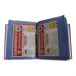 Comprehensive collection of approximately two hundred and twenty Scarborough FC football programmes for the 1999/00, 2000/01, 2001/02 and 2002/03 seasons, all filed within eight dedicated Scarborough FC red Home and Away binders