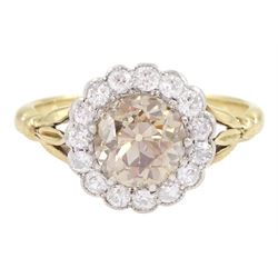  Early 20th century 18ct gold old cut diamond cluster ring, the central fancy light brown diamond of approx 1.60 carat, with a milgrain set white diamond surround of approx 0.45 carat, with Guest & Philips insurance valuation