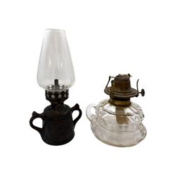 Wells Patent Unbreakable Safety hand held oil lamp, together with a glass hand held oil lamp
