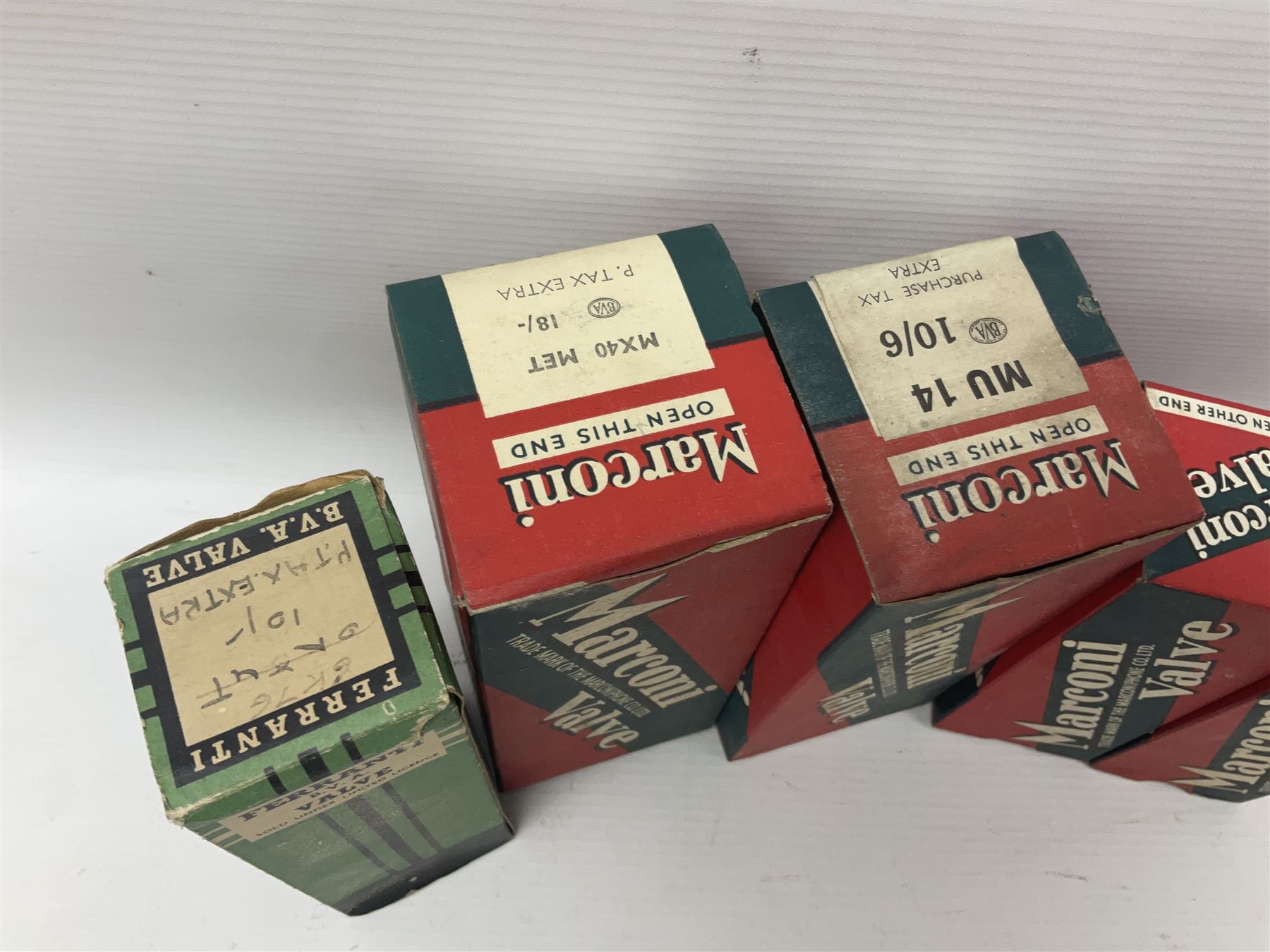 Four Marconi thermionic radio valves/vacuum tubes, comprising MX40, MU14, KTW63 and KT32, boxed, together with three others, to include Ferranti 6K7G valve, boxed, National Union JAN-CNU-6X5G1 and Westing House VU71 I)E/11529 (7)