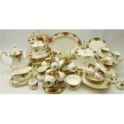  Royal Albert 'Old Country Roses' dinner, tea and coffee service for six persons comprising six dinner plates, six dessert bowls, six larger bowls, oval platter, serving dish, gravy boat and saucer, coffee pot, six coffee cups & saucers, tea pot, six tea cups & saucers, six tea plates, sugar basin, milk jug, cake plate, two cake two tier cake stands, four mugs, salt & pepper, novelty tea pot etc   