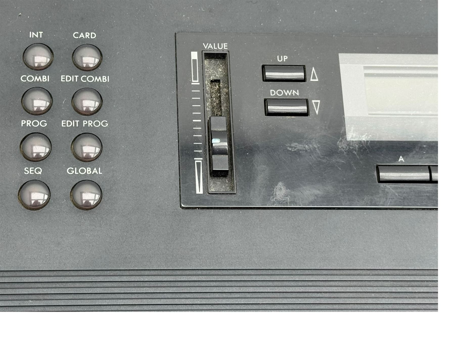 Korg M1 keyboard synthesiser, 61 velocity-sensitive keys with integrated multi-effects and eight-track sequencer, mounted on an adjustable black tubular X-frame stand with rubber end caps