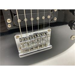 Encore black electric cut-away guitar L96cm; and Spanish Victor Garcia model 187 acoustic guitar, bears label dated 1972 L99cm; each in soft carrying case (2)